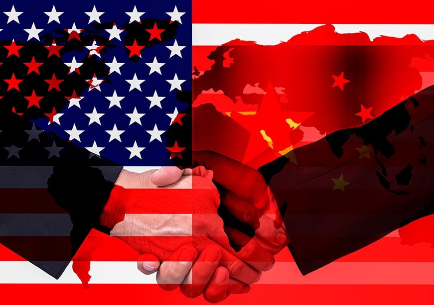 President Donald Trump shaking hands with Chinese officials amid trade talks during Asia diplomacy tour