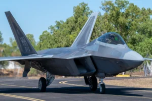 F-22 Raptor that commands MQ-20 Avenger robotic wingman during historic test flight.
