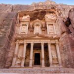 Petra Jordan winter Treasury Al-Khazneh emerging from Siq with dramatic morning light