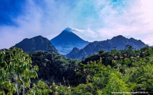 Mount Merapi with fumes from distance Yogyakarta Travel Guide