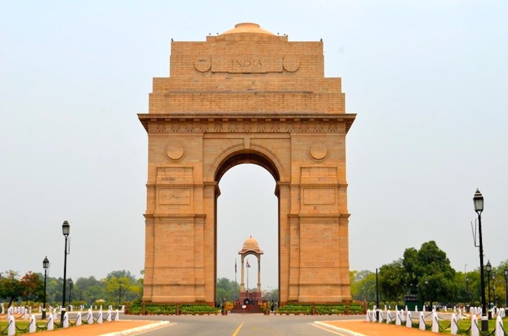 Iconic India Gate sandstone arch at sunset, New Delhi