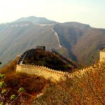 The Great Wall of China at Mutianyu with stunning mountain scenery and cherry blossoms
