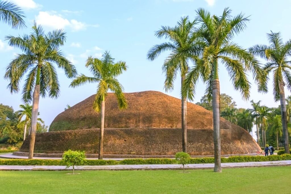 Ramabhar Stupa in Kushinagar, India, an ancient Buddhist cremation memorial surrounded by greenery and landscaped pathways