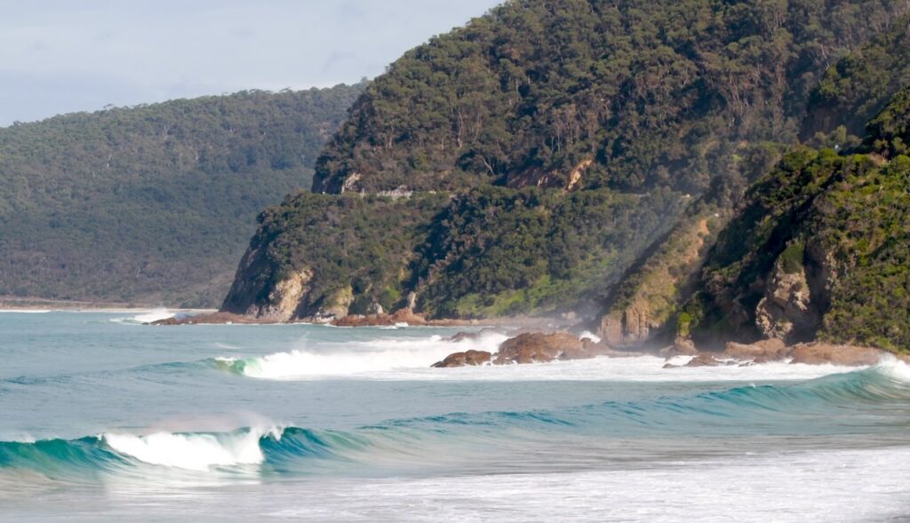Coastal cliffs and ocean waves along the Great Ocean Road