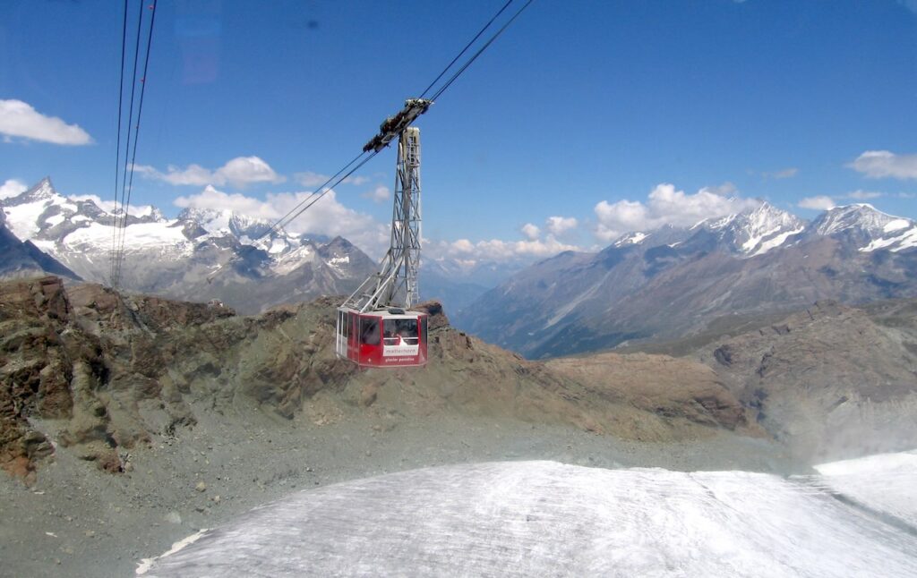 Cable car gliding over glaciers towards Matterhorn Glacier Paradise